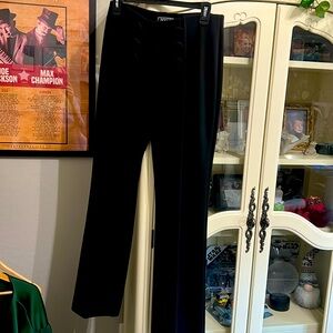 Black stretch pants with button detail